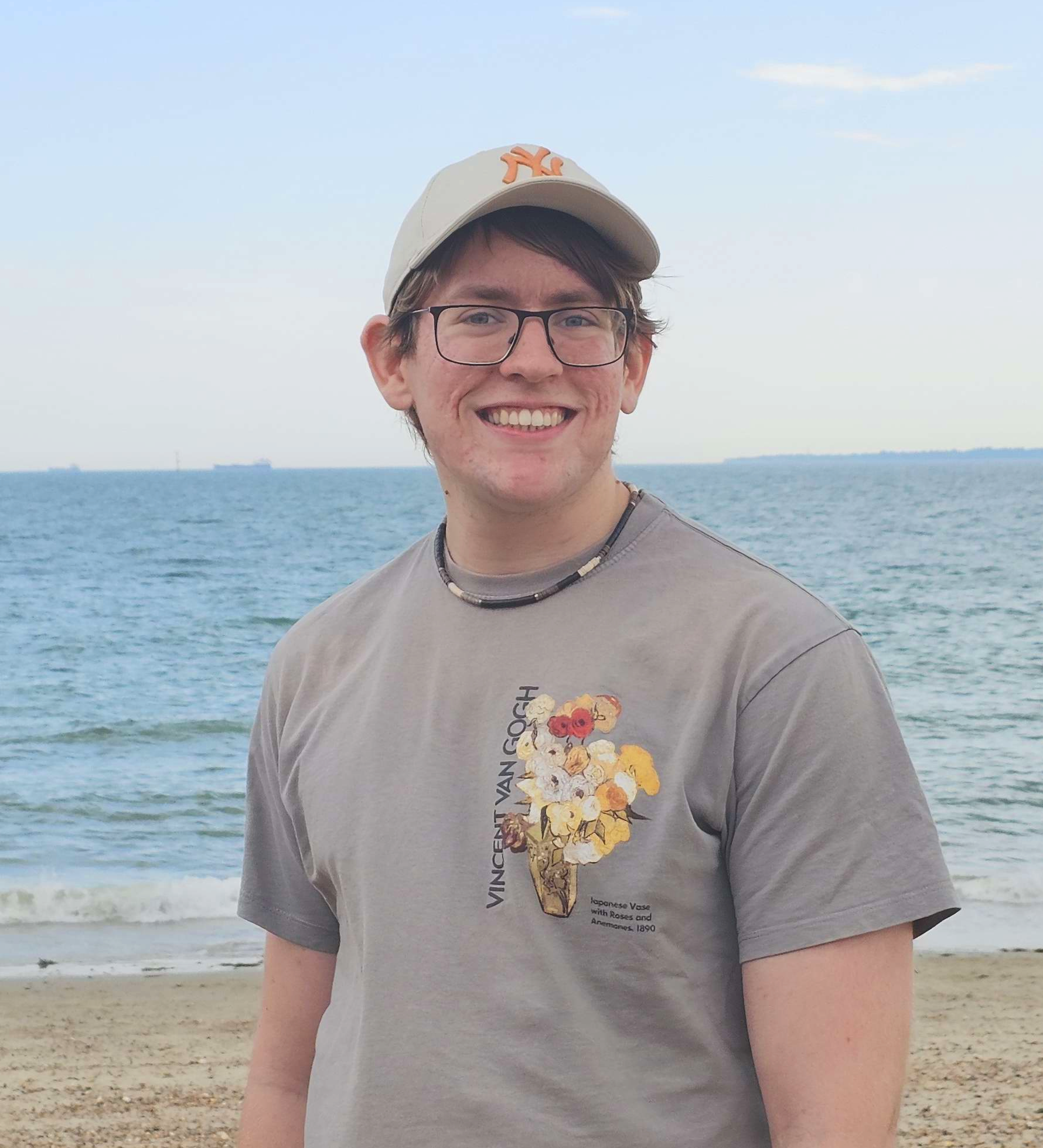 Medium-shot picture of me at the beach.